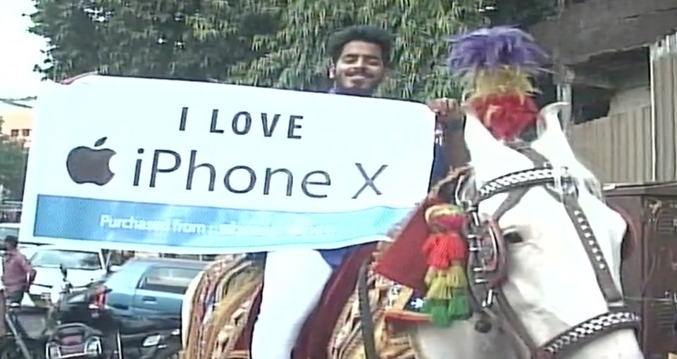 Man goes to purchase iPhone X riding a Horse with Dhol